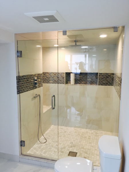 beautiful custom glass shower door and wall